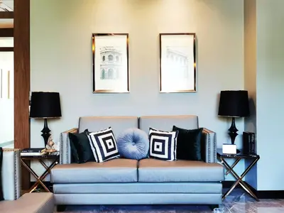 a living room with a couch with pillows at Luxury 2 Bedroom Private Pool Villa in Kamala Walk to Beach Shops and Dining in Kamala Beach