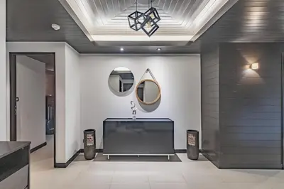 a bathroom with a sink and a mirror at 3BR Casa Oasis - Beachfront Home in Laguna & Layan Chom Tawan and Maan Tawan Residences in Phuket Town