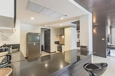 a kitchen with a stainless steel counter top and appliances at 3BR Casa Oasis - Beachfront Home in Laguna & Layan Chom Tawan and Maan Tawan Residences in Phuket Town