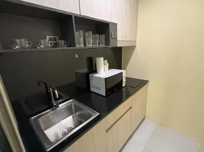 a kitchen counter with a sink and a microwave at Great value! Convenient studio near Kamala beach in Kamala Beach