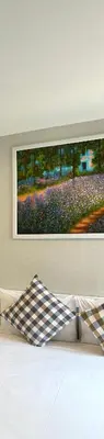 a painting hanging on a wall above a bed at G15 ВАТСАП669З5В2I976 оплата РУБЛИ in Nai Yang Beach