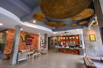 a restaurant with a bar with wooden ceiling at Aonang Viva Resort - SHA Plus in Ao Nang Beach