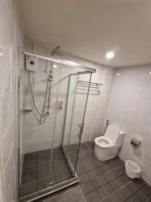 a bathroom with a shower and a toilet at Bonanza Patong Beach1 100m to Beach Star Room in Patong Beach