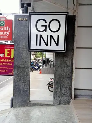a sign that says go inn on the side of a building at XX GO INN Aonang Beach โกอินน์ หาดอ่าวนาง in Ban Khlong Haeng