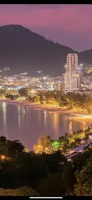 a view of a city at night with a river at PATONG TOWER SEA FACING HIGH FLOOR New Bathroom in Patong Beach