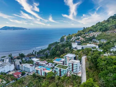 an aerial view of a city and the ocean at Patong Kalim Unparalleled Sea View B&B Resort in Patong Beach