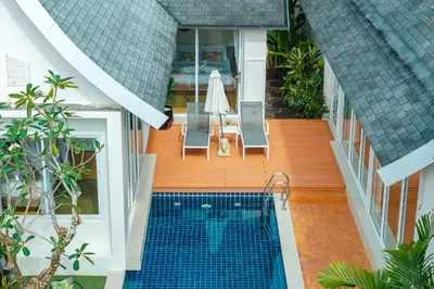 an aerial view of a house with a swimming pool at Rosemary Villa 4 bedrooms with Pool near BangTao Beach in Bang Tao Beach