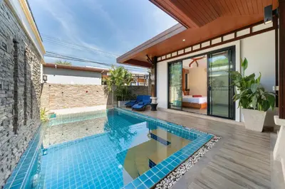 an infinity pool in a house at Private 2BR Pool Villa 2D15 in Gated Residences Rawai VIP Villas near Kids Park in Rawai Beach