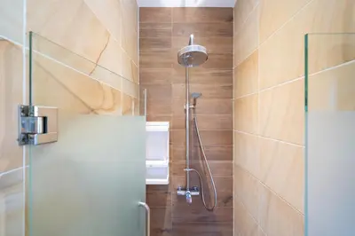 a bathroom with a shower with a glass door at Private 2BR Pool Villa 2D15 in Gated Residences Rawai VIP Villas near Kids Park in Rawai Beach