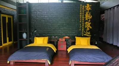 two beds sitting next to each other in a room at 05 - Exquisite Paradise Retreat in Nai Thon Beach