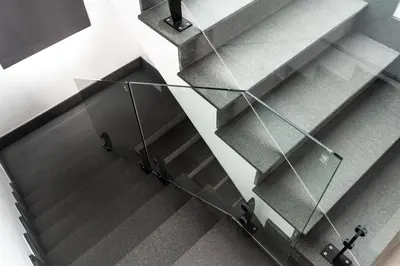 a metal staircase with glass railings in a building at Laguna Park 4 Bedrooms Villa by NLA in Phuket Town