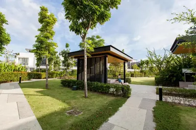 a small pavilion in a park with trees at Laguna Park 4 Bedrooms Villa by NLA in Phuket Town