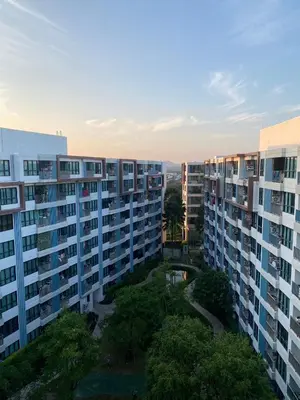 an aerial view of some apartment buildings at Centrio Condominiums Top Floor with Pool and Garden view in Ban Na Khua