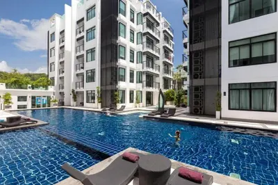 an image of a swimming pool in a building at Kamala Regent by RESAVA in Kamala Beach