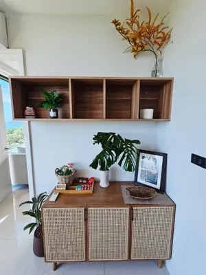 a room with a desk with plants on a wall at The viva patong condo C602 in Patong Beach