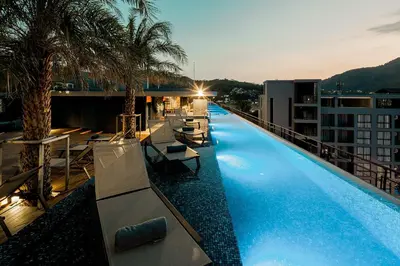 a swimming pool on the roof of a building at Citygate serviced apartments Kamala beach, rooftop pool and gym P311 in Kamala Beach
