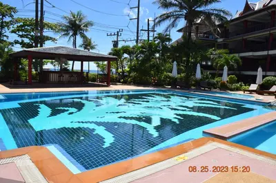 a swimming pool in a resort at Kalim Residence in Patong Beach