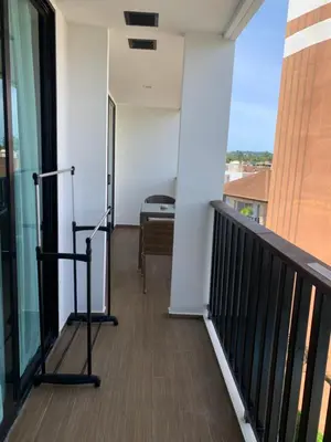 a balcony with a view of a room at Luxury Suite Room by Atlas X in Kata Beach