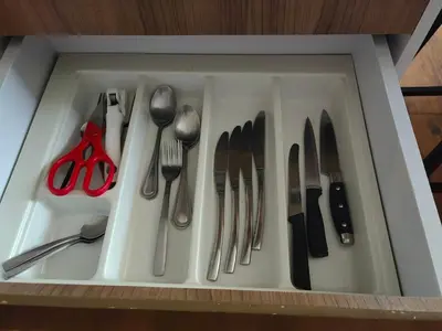 a utensil drawer filled with utensils at Luxury Suite Room by Atlas X in Kata Beach