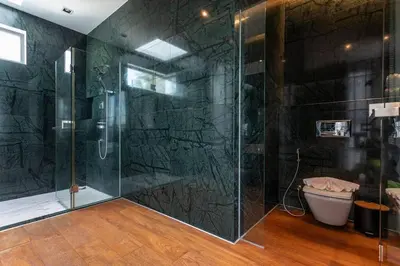 a bathroom with a glass shower with a tub at Do You Want Luxury Sea views With Beach Access V38 in Rawai Beach