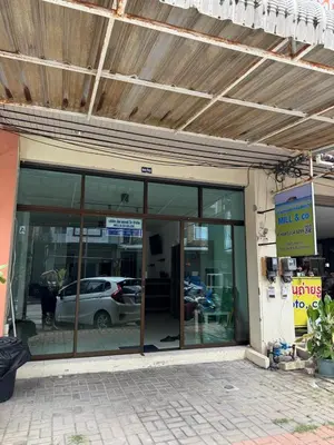 a parking garage with a car inside of it at Apartments Kata Beach in Kata Beach