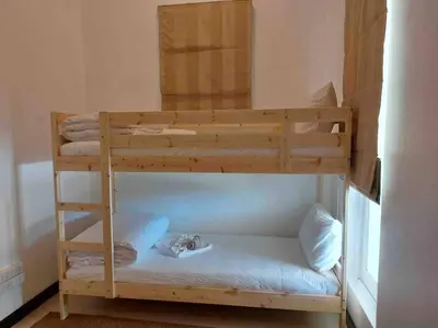 a bunk bed in a small room with a bunk bed in a room at Luxurious 5 bedroom 5 bathroom Gym Views v138 in Kamala Beach
