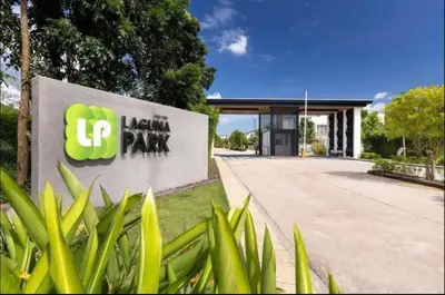 a sign for the lenovo park in front of a building at Happy House in Laguna Park in Laguna Phuket