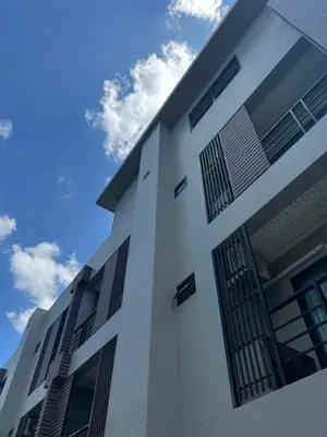 a white building with the sky in the background at BS KRABI HOTEL in Ban Khlong Haeng
