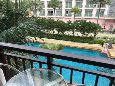 a view of a swimming pool from the balcony of a hotel at Phuket Villa Patong,Pool View in Patong Beach