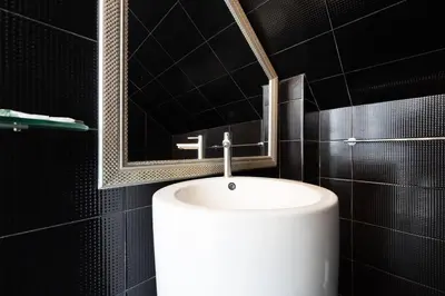 a bathroom with a white sink and a mirror at Secluded Paradise Your Exclusive Villa Retreat V82 in Rawai Beach