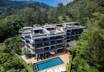 an aerial view of a building with a swimming pool at Pool view studio at Nakalay Palm by Lofty in Kamala Beach