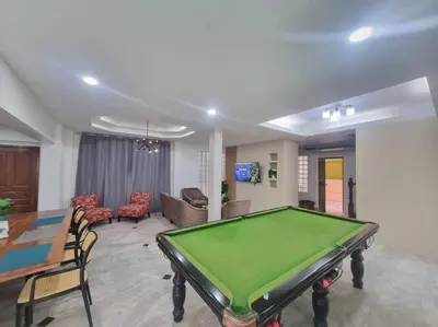 a living room with a pool table in it at Cozy Villa 4 Bedrooms Patong,7mins. walk beach/10mns.Bangla Rd in Patong Beach