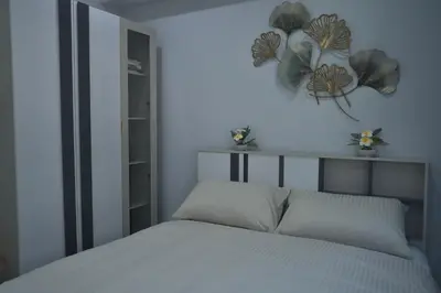 a bedroom with a bed and a heart wall at GORGEOUS NEW DESIGNED 4br KataBeach sweetHome in Kata Beach
