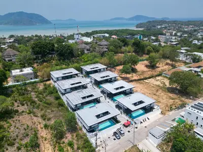 an aerial view of a group of camper homes at LUXURY 4BR Oxygen Pool Villa Near Nai Harn Beach - Sunset Garden 7 in Rawai Beach