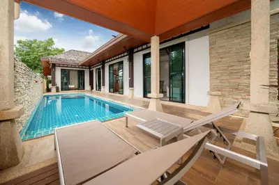 an external view of a house with a swimming pool at VIP Pool Villa 3E1 230m Rawai Beach in Rawai Beach