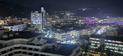 a view of a city at night with lights at Patong tower 2bedroom 2 bathrooms, corner view in Patong Beach