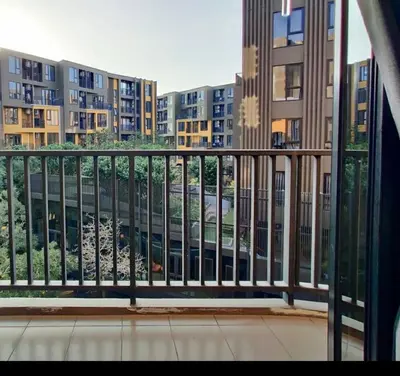 a balcony with a view of a city with buildings at THE BASE CENTRAL Phuket Shopping Mall Central Floresta in Ban Rangeng