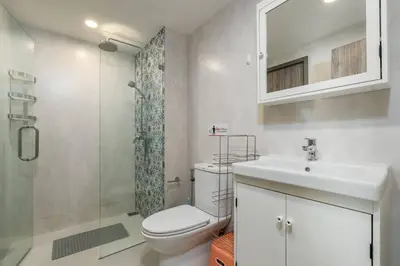 a bathroom with a toilet and a sink and a shower at С1O Новые Рубль ватсап669З582I976 in Nai Yang Beach