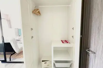 a white closet with a desk and a table at B4 БАССЕЙН ВаТСАП669З582I976 in Nai Yang Beach