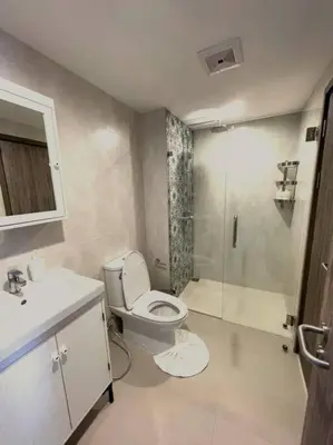 a bathroom with a toilet and a shower at B4 БАССЕЙН ВаТСАП669З582I976 in Nai Yang Beach