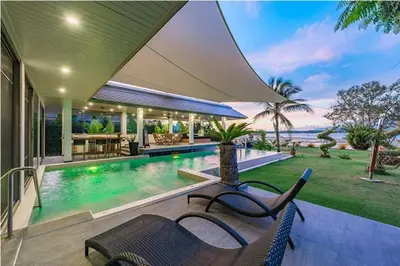 an image of a house with a swimming pool at Mai Khao Beach Luxury 7-bedroom villa 0 meters from the sea double infinity pool maid, outdoor wedding sea fishing in Mai Khao Beach