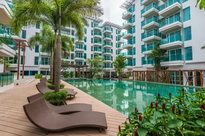 an image of a swimming pool in a building at Fishermens Harbour Urban Resort - SHA Extra Plus in Patong Beach