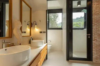 a bathroom with a large sink and a shower at New Ultra Modern Designer Furniture Gym #v62 in Chalong