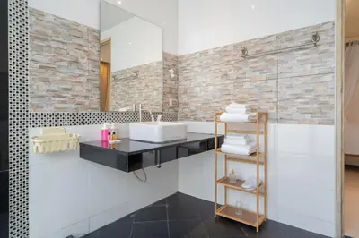 a bathroom with a sink and a shower at Bangtao Beach Villa with a Long pool 12 meters in Phuket Town
