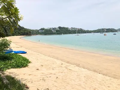 a sandy beach with boats in the water at Bali style 4 bedroom beachfront Villa Ao Yon in Ban Ao Makham