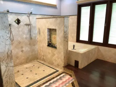 a bathroom with a shower and a sink at Bali style 4 bedroom beachfront Villa Ao Yon in Ban Ao Makham