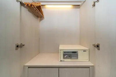 a small microwave sitting on a counter in a room at Deluxe apartment at Cassia Residences by Lofty in Bang Tao Beach