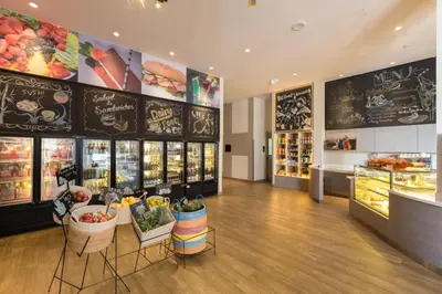 a grocery store with a lot of food on display at Deluxe apartment at Cassia Residences by Lofty in Bang Tao Beach
