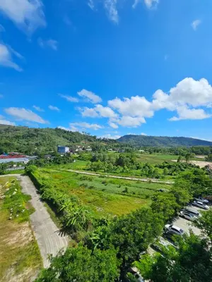 an aerial view of a field and a road at The Title Halo 1 Jupiter in Nai Yang Beach
