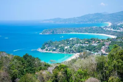 an aerial view of a beach and the ocean at OYO 1162 Chalong Home Place in Ban Klang